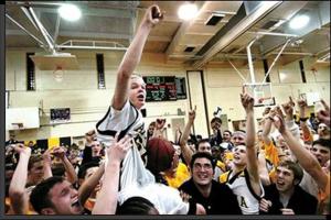 Happiness abounds, as Jason McElwain (aka J-Mac) celebrates his heroic feat 